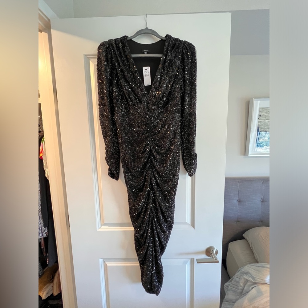 Express sequin evening dress with 3/4 sleeve. New with tags in size small!
